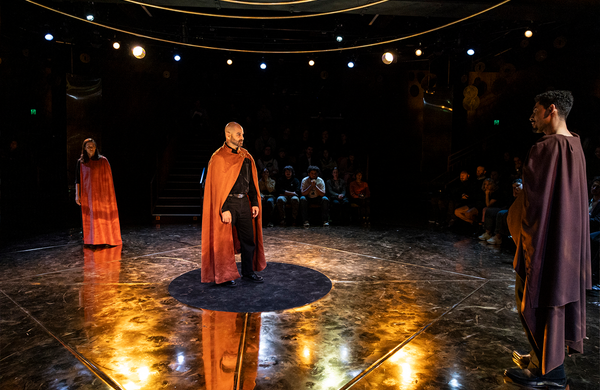 Lizzie Schebesta, Shameer Birges and Darius Williams standing on the set of King Lear, 2024.